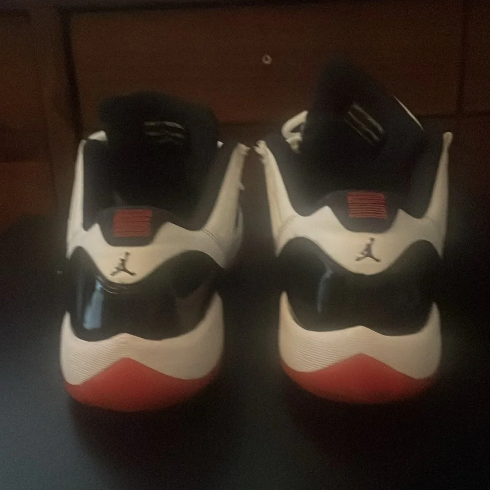 They are Jordan’s size 7y black an white with red bottoms. - Picture 3 of 3